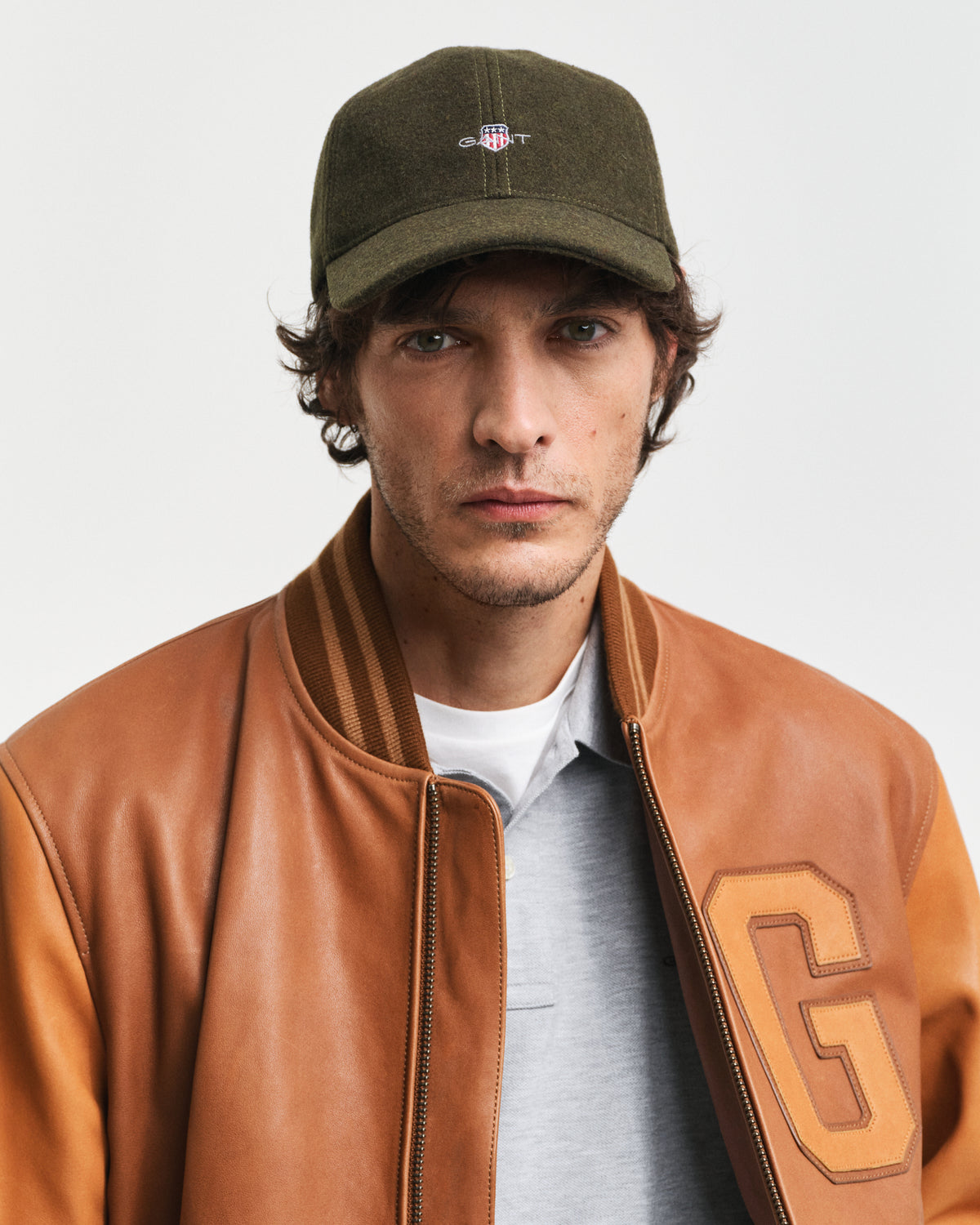 JUNIPER GREEN, SHIELD MELTON CAP BY GANT AU.