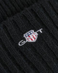 BLACK, UNISEX. SHIELD WOOL BEANIE, CLOSE-UP BY GANT AU.