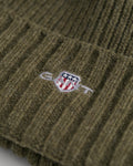 JUNIPER GREEN, UNISEX. SHIELD WOOL BEANIE, CLOSE-UP BY GANT AU.