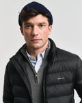 MODEL WEARING LIGHT DOWN JACKET