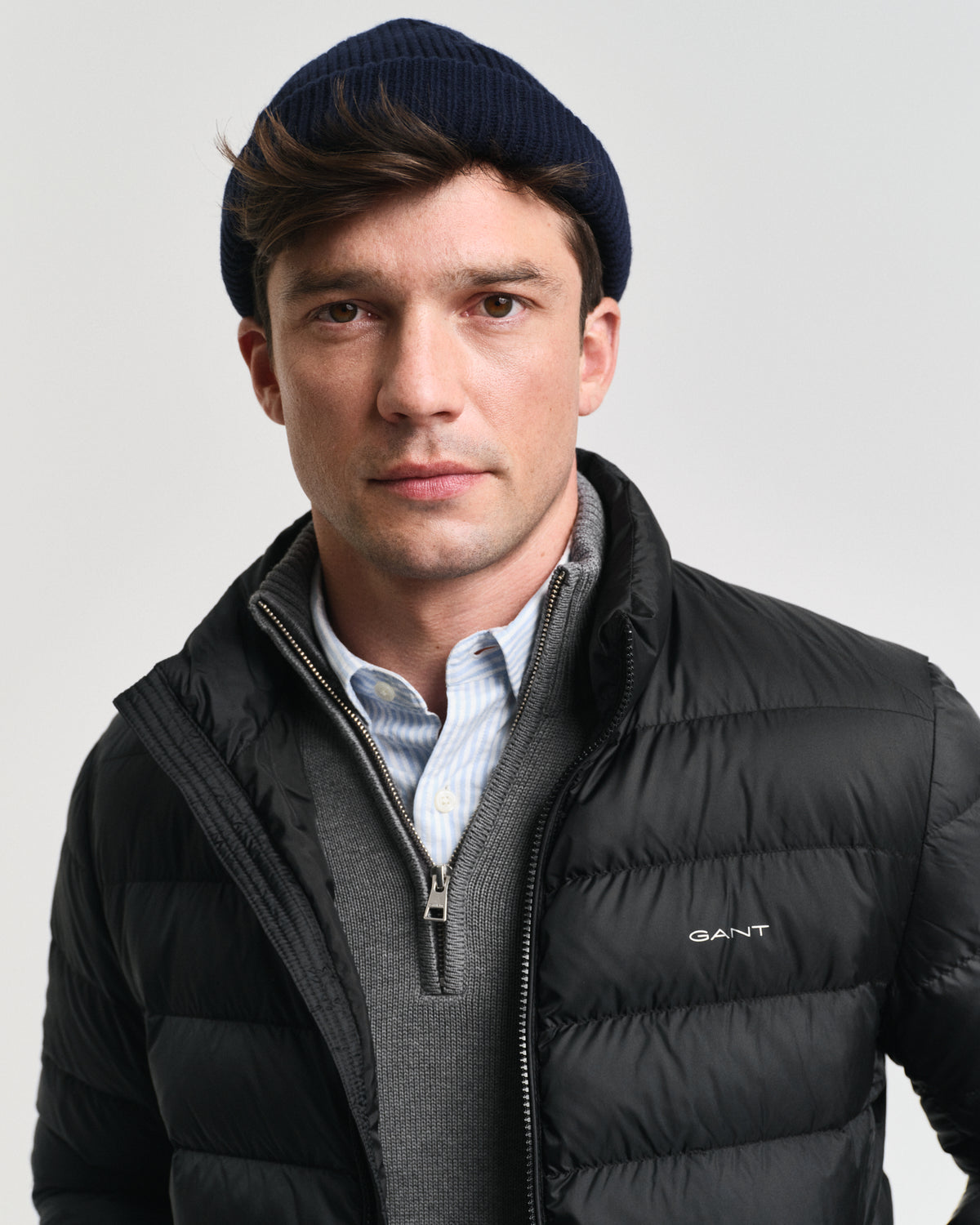 MODEL WEARING LIGHT DOWN JACKET