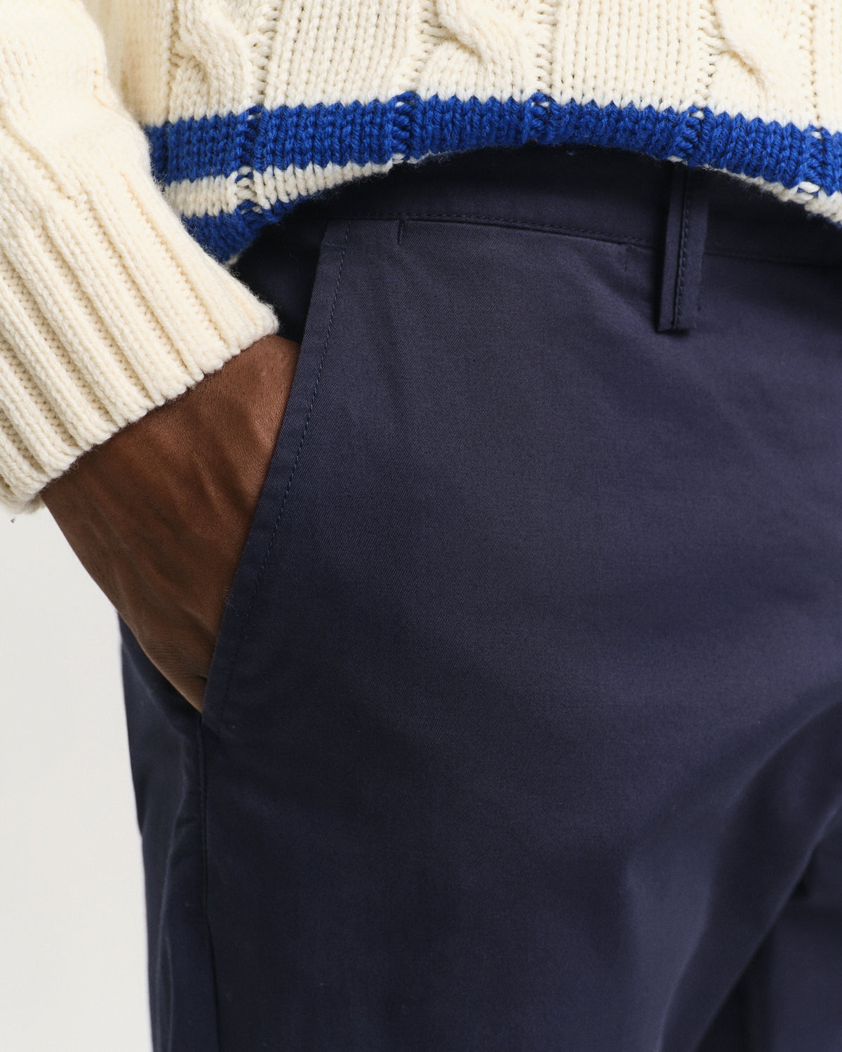 MODEL WEARING REGULAR TWILL CHINOS