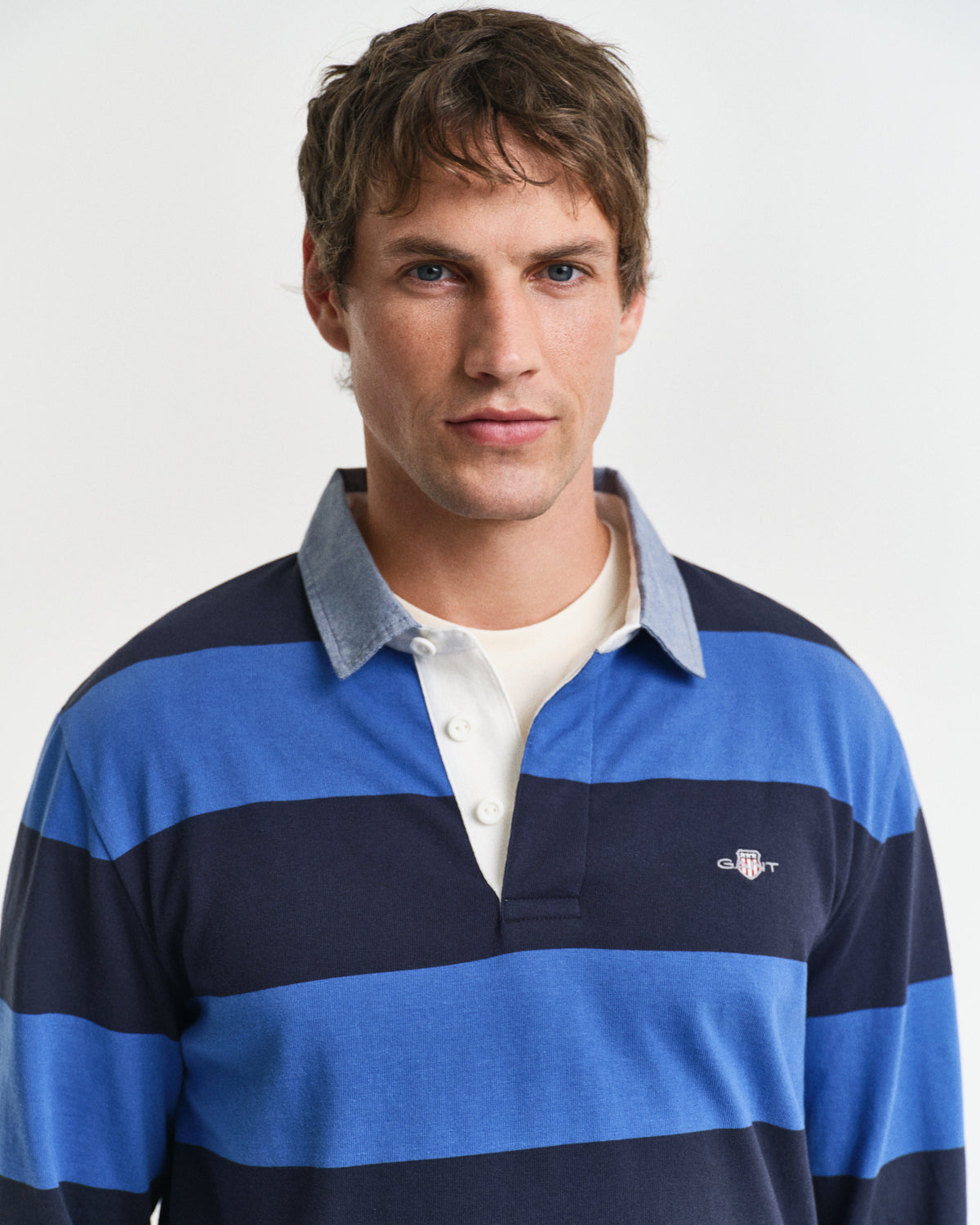 RICH BLUE, REG CHAMBRAY STRIPE HEAVY RUGGER, CLOSE-UP BY GANT AU.