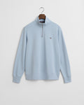 FRESH BLUE, REG SHIELD HALF ZIP SWEAT, FLAT-LAY BY GANT AU.
