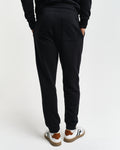 BLACK, REG SHIELD SWEATPANTS, BACK-VIEW BY GANT AU.