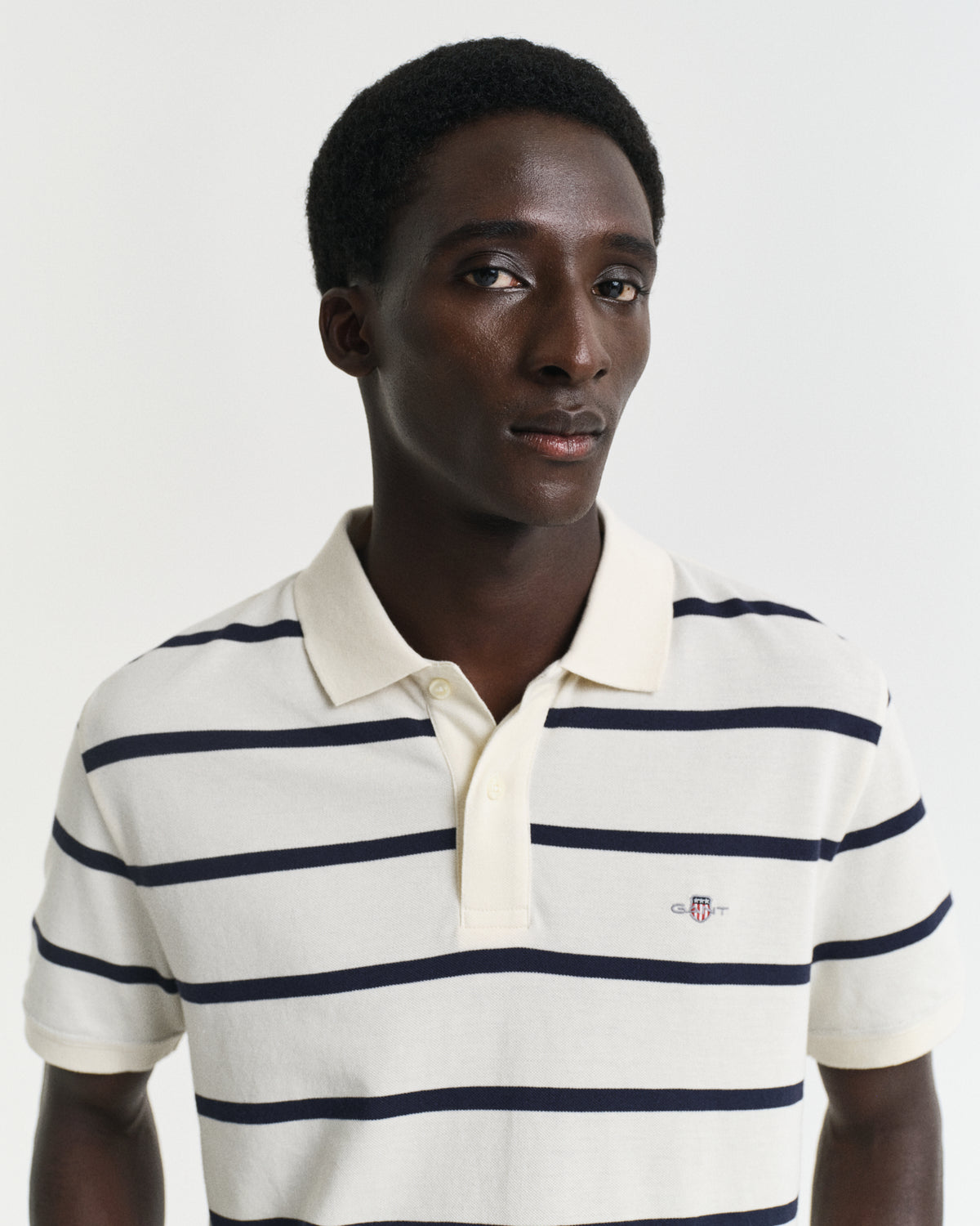 CREAM, STRIPED POLO, CLOSE-UP BY GANT AU.