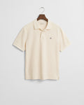 CREAM, TEXTURED POLO, FLAT-LAY BY GANT AU.