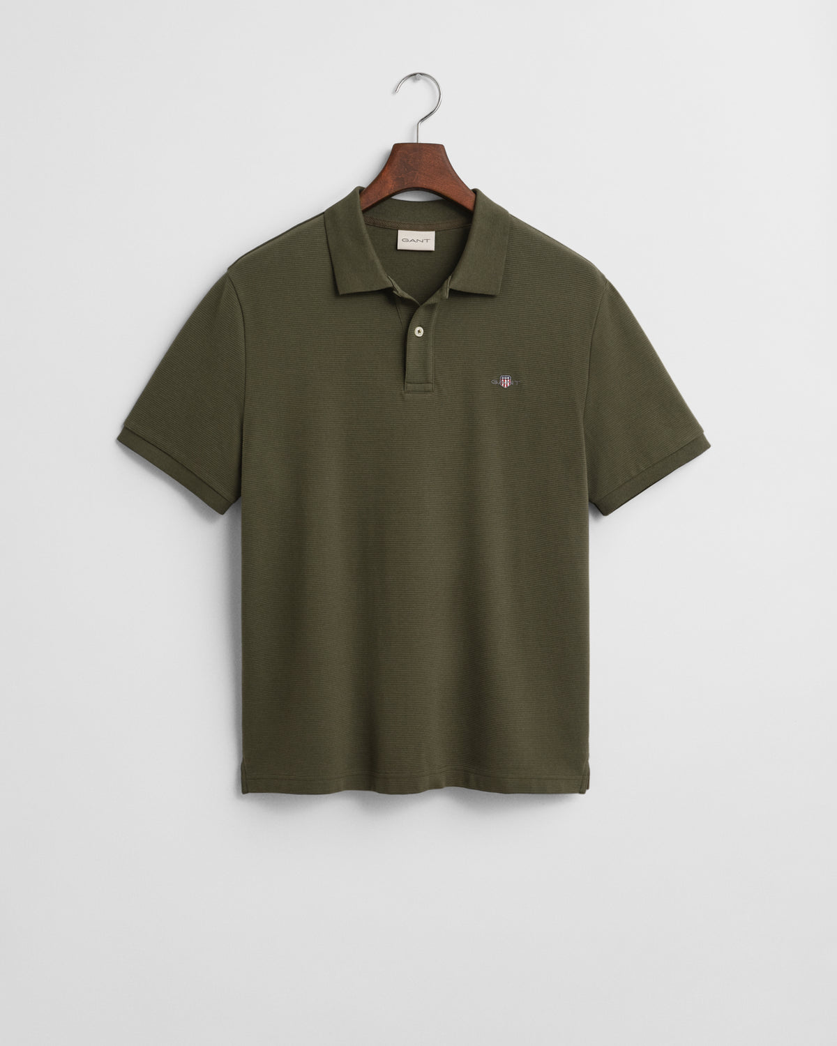 JUNIPER GREEN, TEXTURED POLO, FLAT-LAY BY GANT AU.
