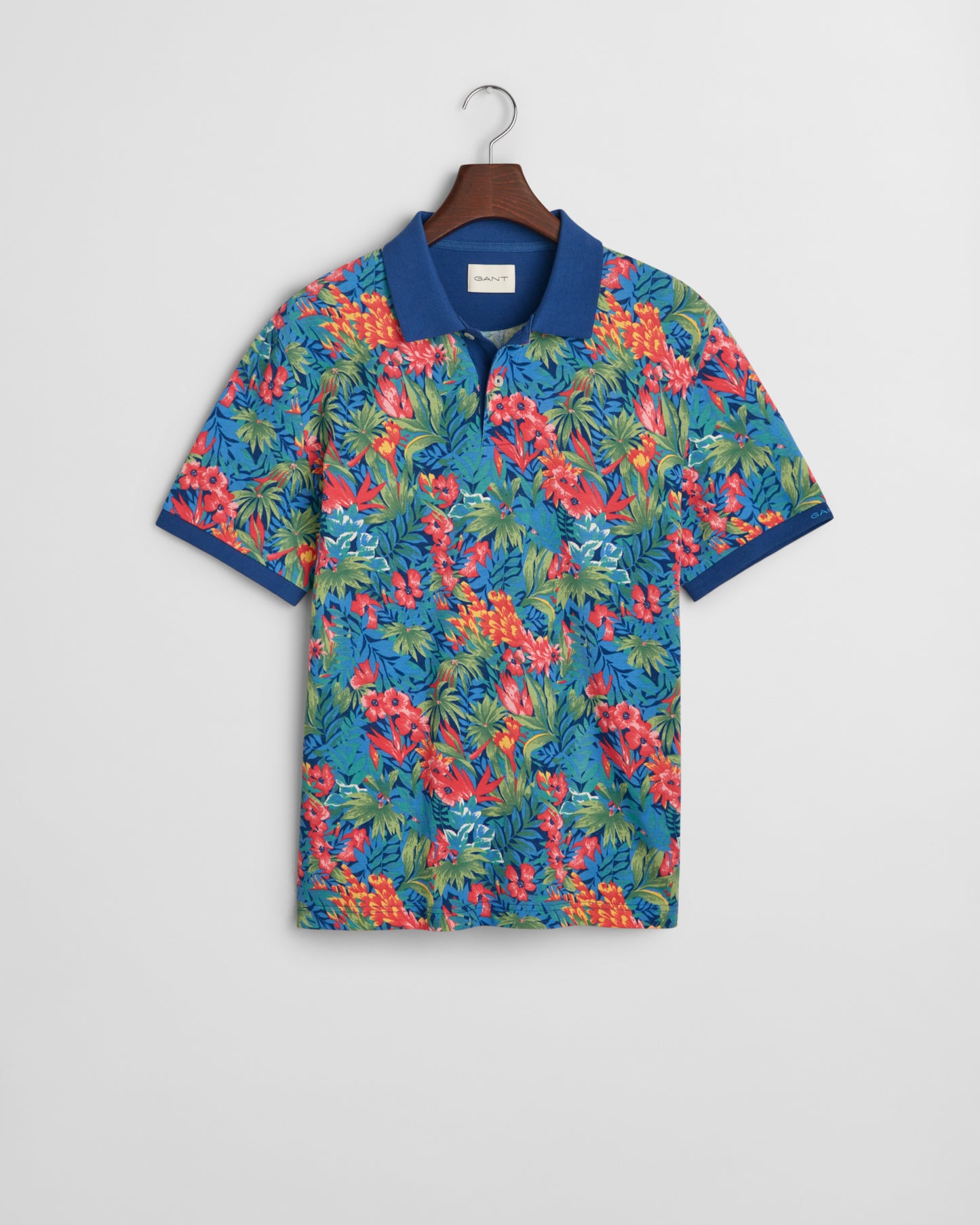 DEEP COBALT, PRINTED SS POLO, FLAT-LAY BY GANT AU.