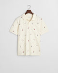 CREAM, EMBROIDERED GRAPHIC POLO, FLAT-LAY BY GANT AU.