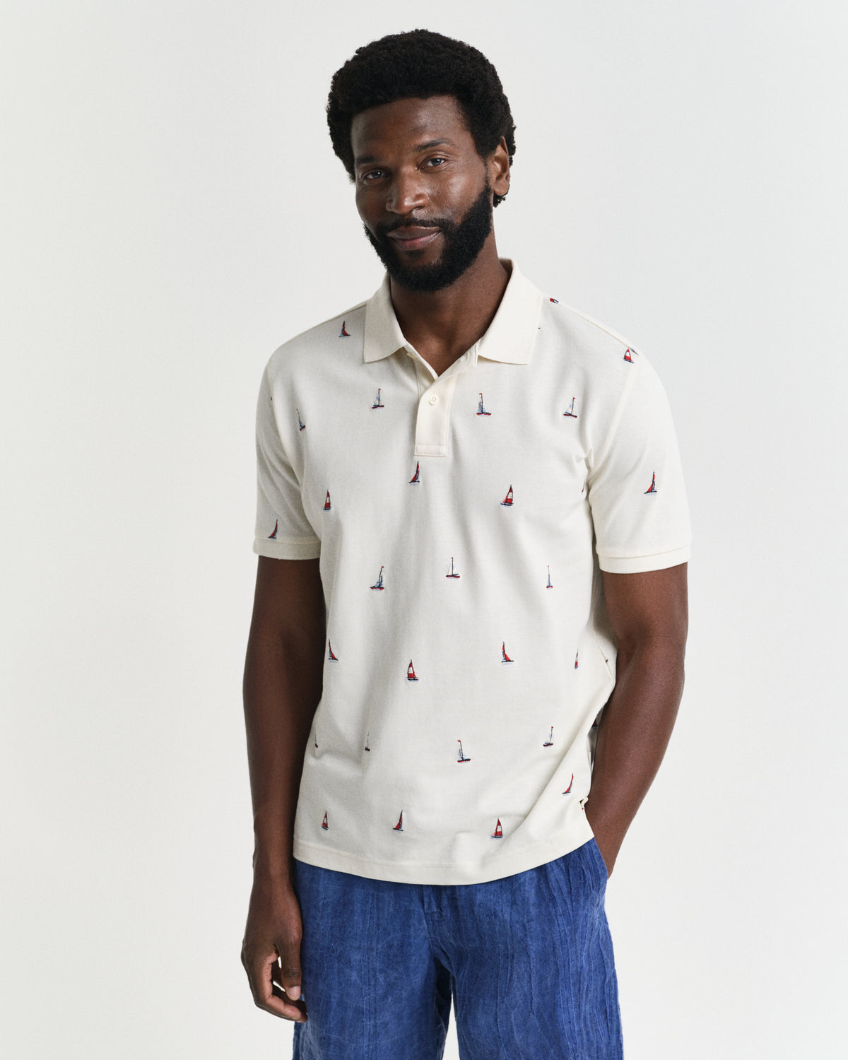 CREAM, EMBROIDERED GRAPHIC POLO, FRONT-VIEW BY GANT AU.