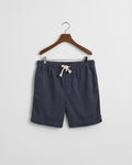 EVENING BLUE, REG SUNFADED DS SHORTS, FLAT-LAY BY GANT AU.