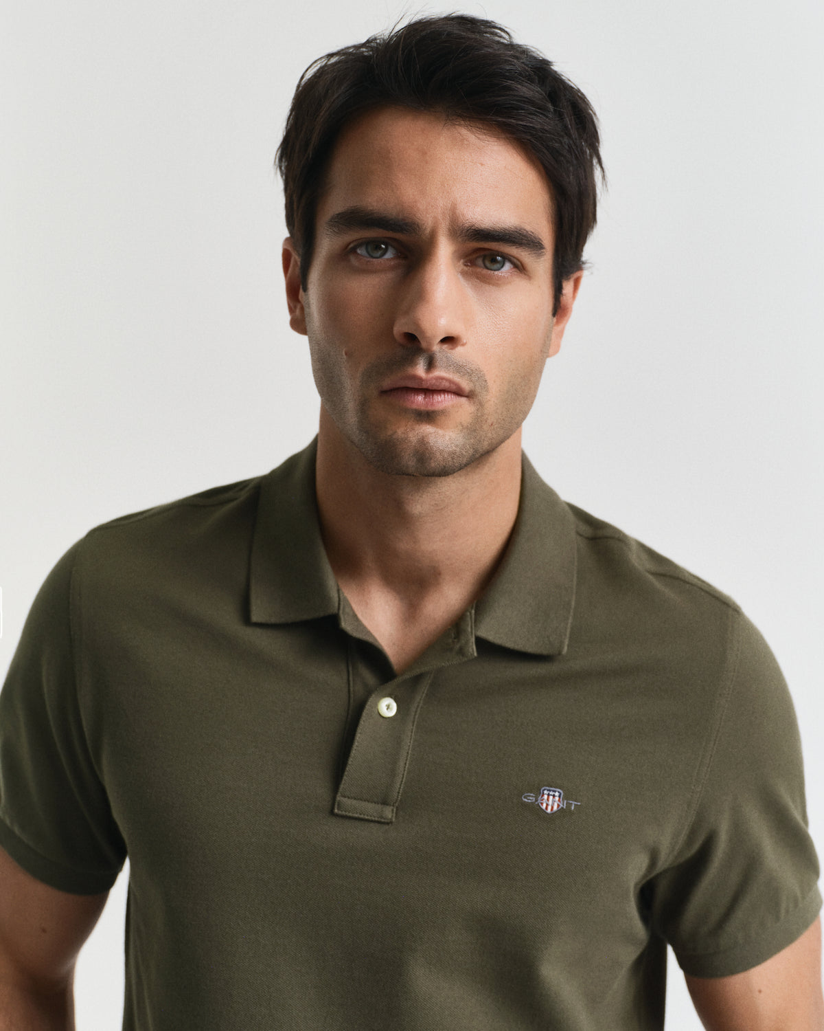 JUNIPER GREEN, REG SHIELD SS PIQUE POLO, CLOSE-UP BY GANT AU.