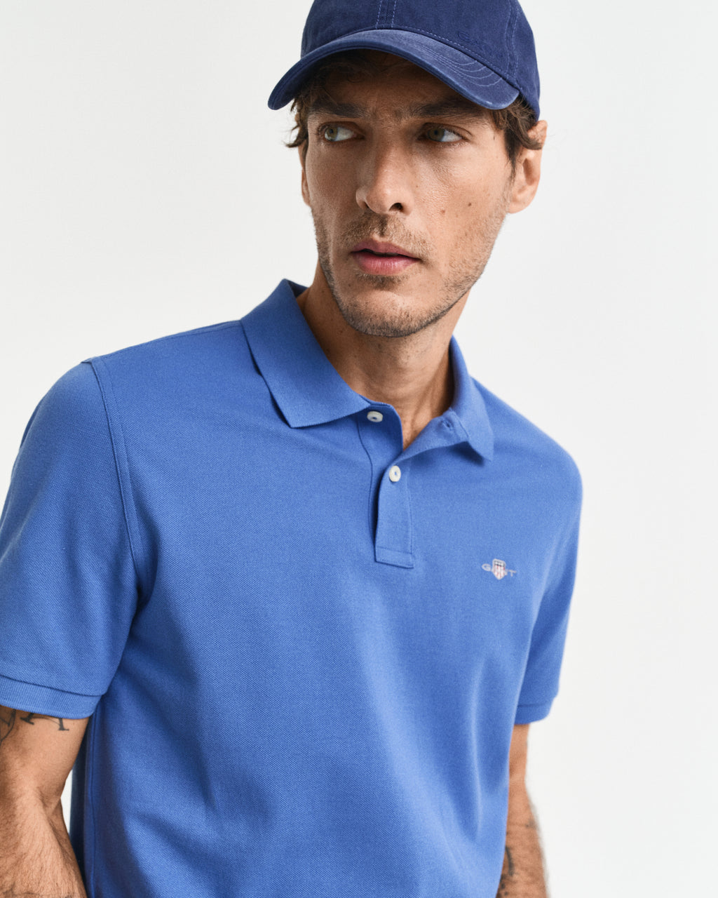 RICH BLUE, REG SHIELD SS PIQUE POLO, CLOSE-UP BY GANT AU.
