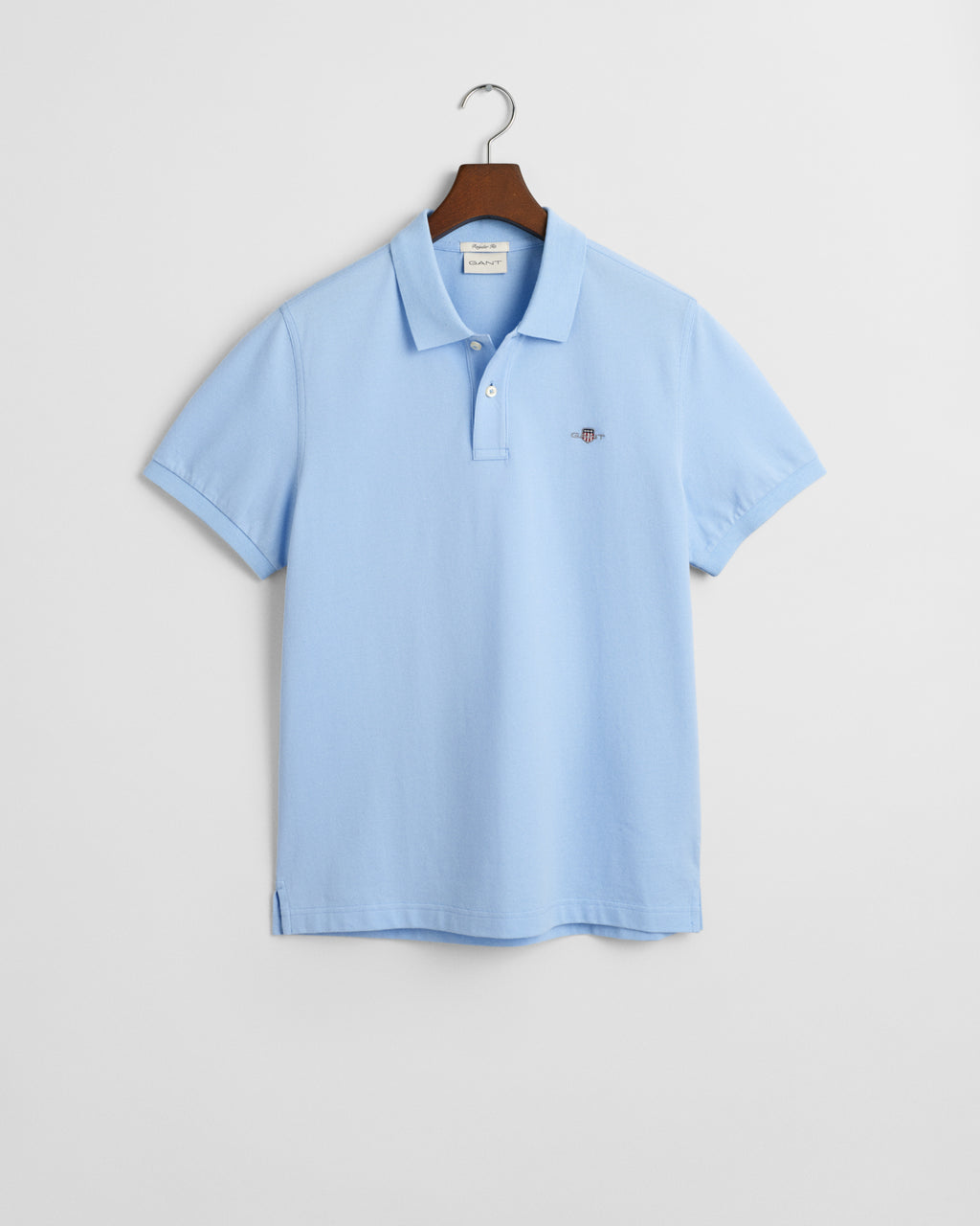 CAPRI BLUE, REG SHIELD SS PIQUE POLO, FLAT-LAY BY GANT AU.