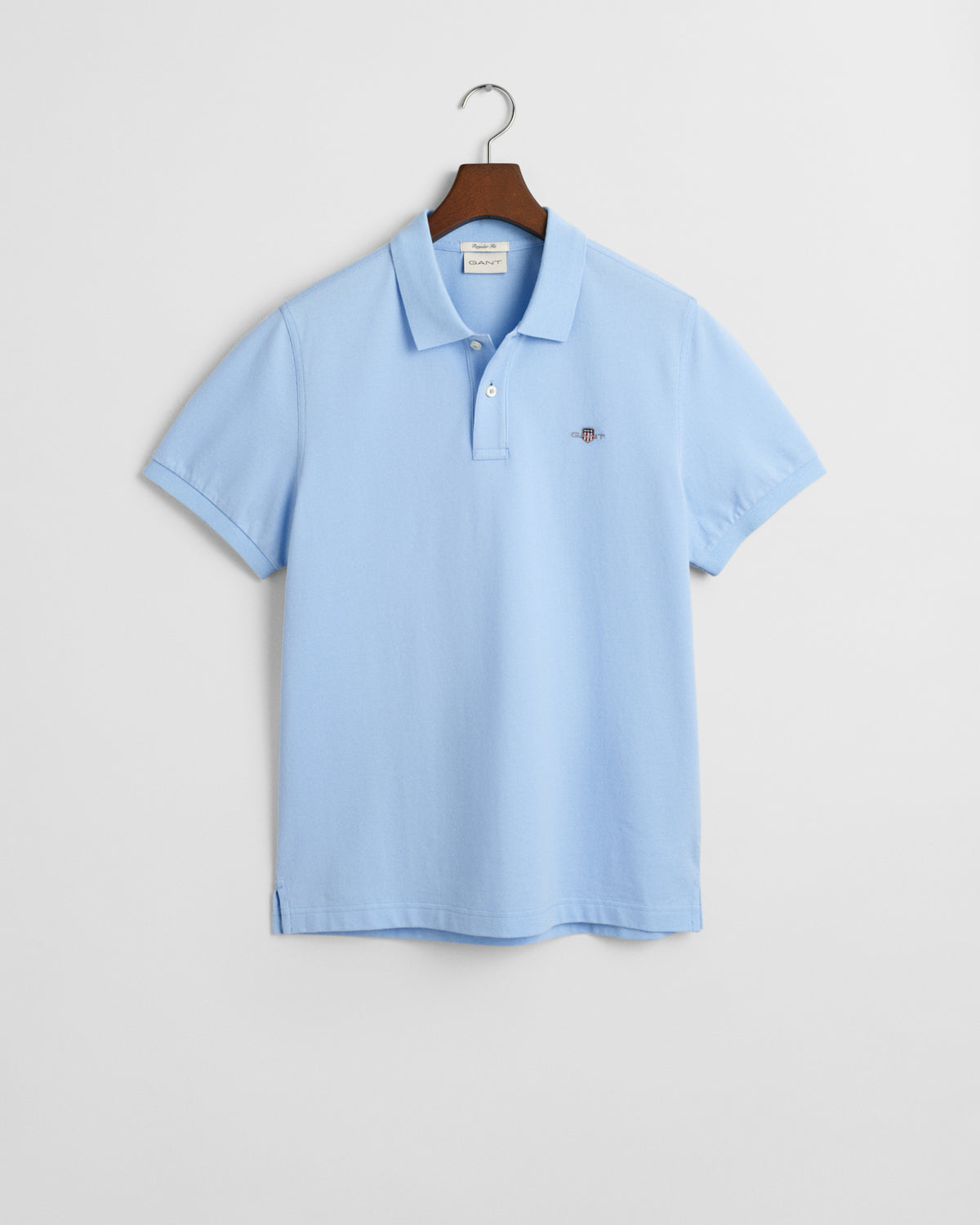 CAPRI BLUE, REG SHIELD SS PIQUE POLO, FLAT-LAY BY GANT AU.