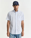 MODEL WEARING REG POPLIN GINGHAM SS SHIRT