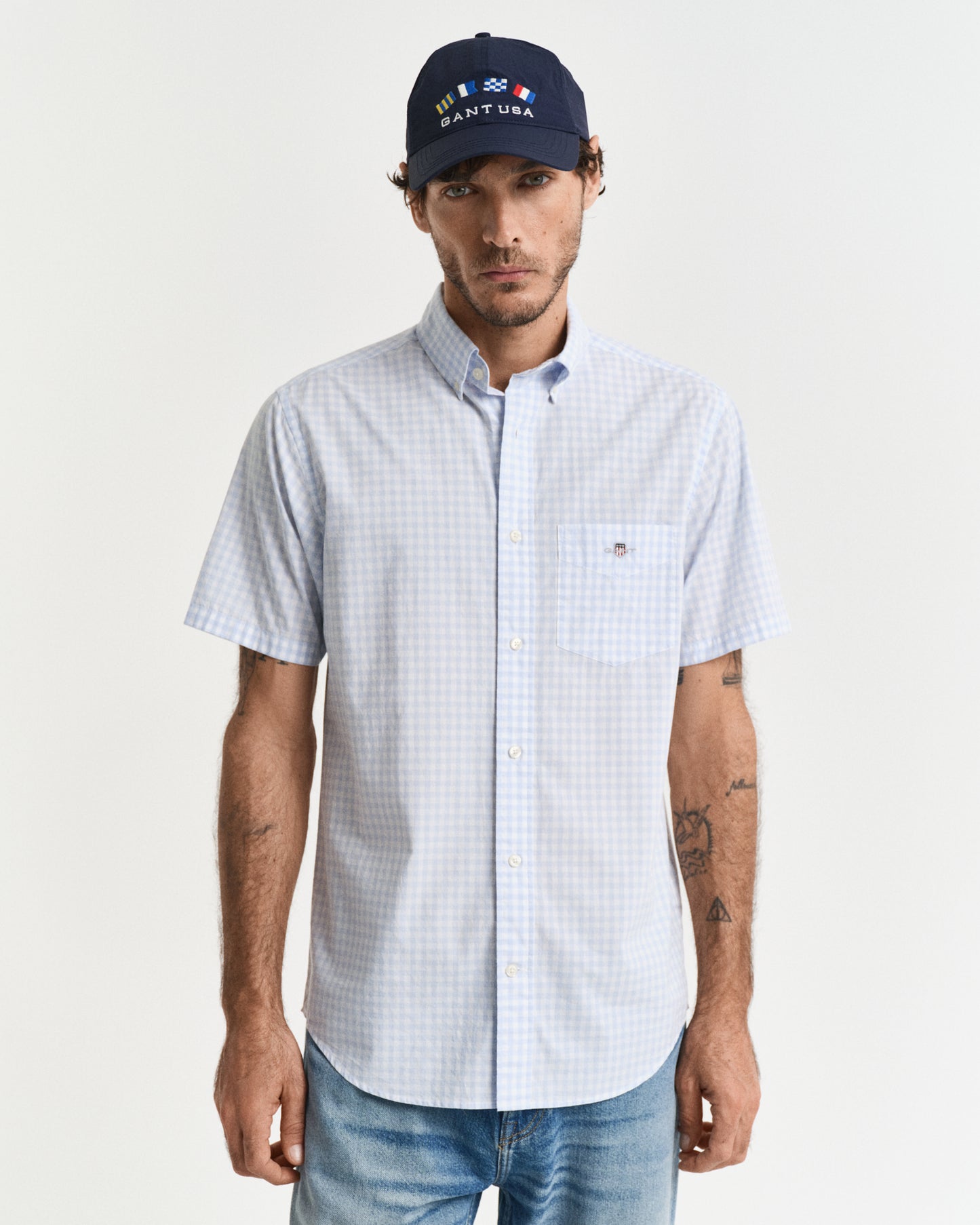 MODEL WEARING REG POPLIN GINGHAM SS SHIRT