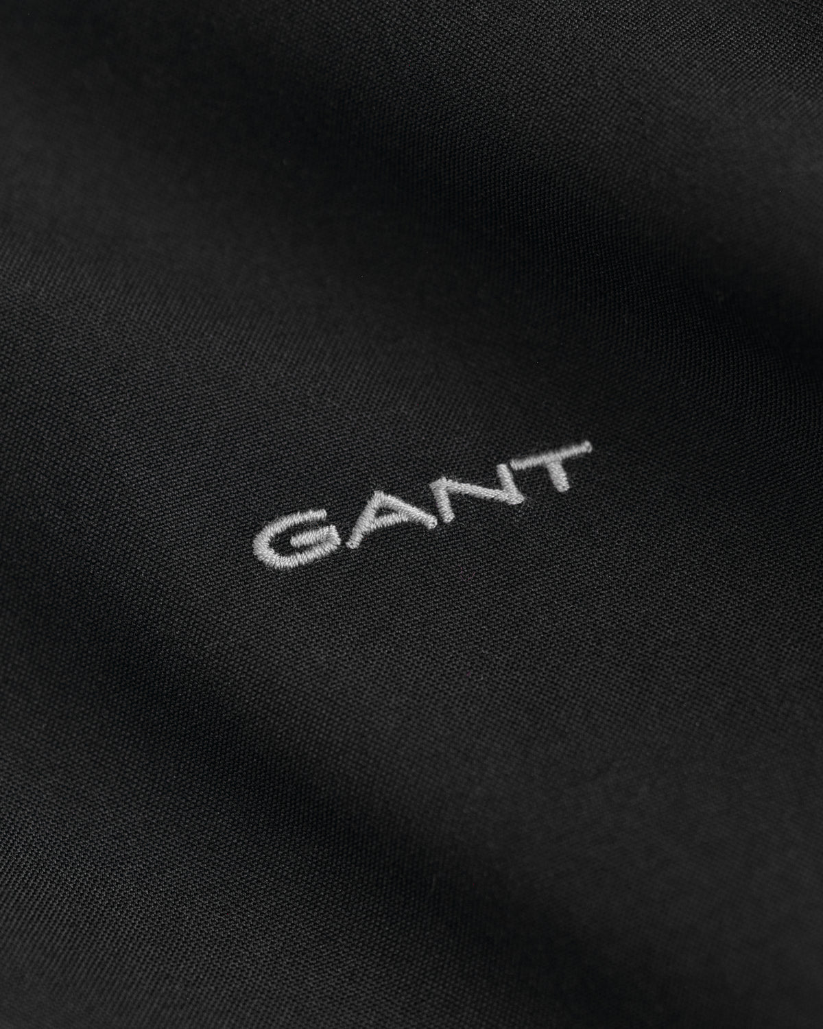 BLACK, REG PINPOINT OXFORD SHIRT, FLAT-LAY BY GANT AU.