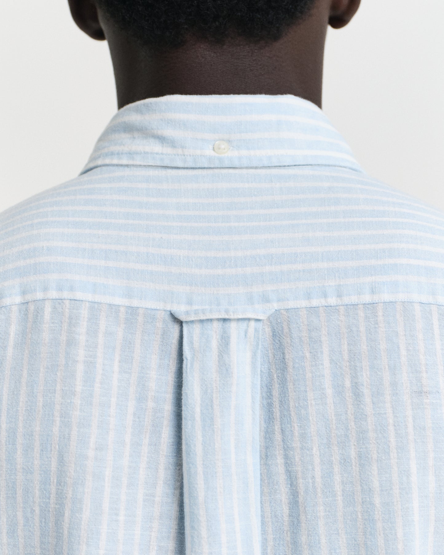 MODEL WEARING REG COTTON LINEN STRIPE SHIRT