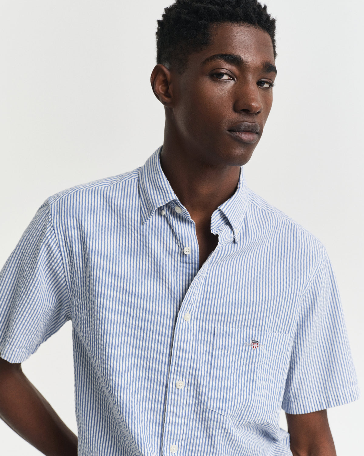 MODEL WEARING REG SEERSUCKER STRIPE SS SHIRT