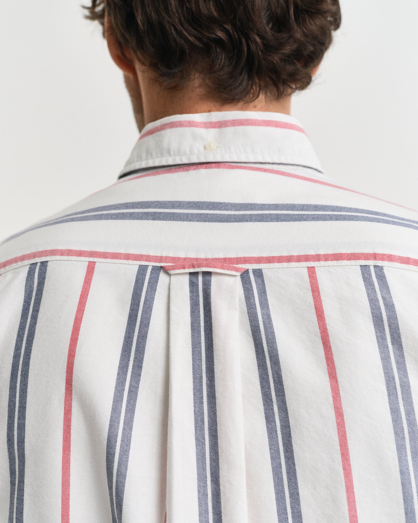 MODEL WEARING REG ARCHIVE OXFORD STRIPE