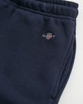 EVENING BLUE, REG SHIELD SHORTS, FLAT-LAY BY GANT AU.