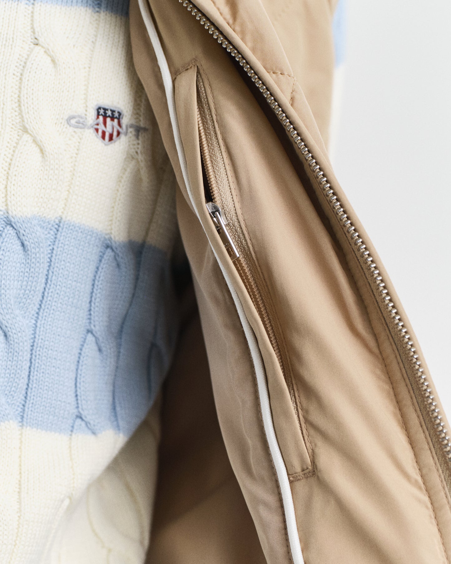 MODEL WEARING QUILTED WINDCHEATER VEST