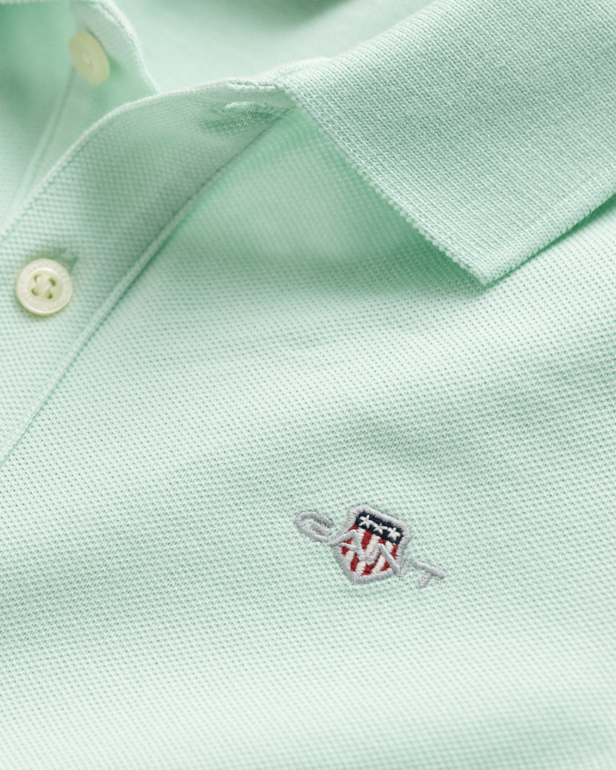 FADED MINT, SHIELD SS PIQUE, CLOSE-UP BY GANT AU.