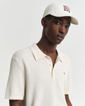 CREAM, MICRO TEXTURED COTTON SS POLO, CLOSE-UP BY GANT AU.