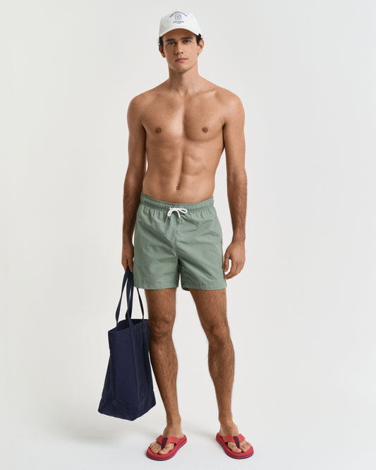 KALAMATA GREEN, SWIM SHORTS BY GANT AU.