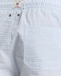 MODEL WEARING SEERSUCKER SWIM SHORTS