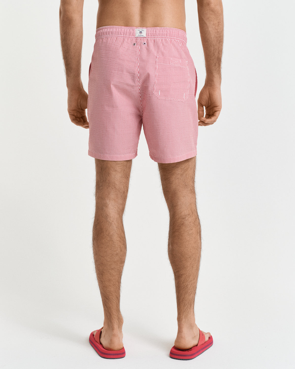 RUBY RED, SEERSUCKER SWIM SHORTS, BACK-VIEW BY GANT AU.