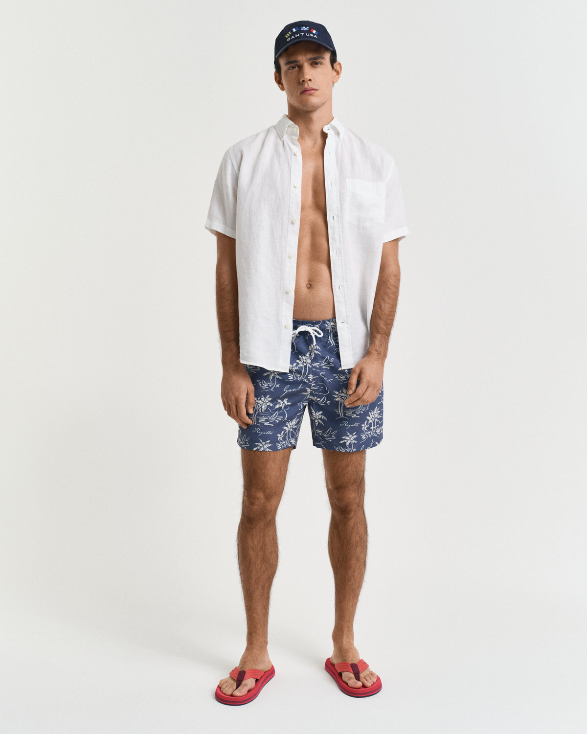 DUSTY NAVY, ISLAND PRINT SWIM SHORTS BY GANT AU.