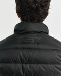 MODEL WEARING LIGHT DOWN JACKET