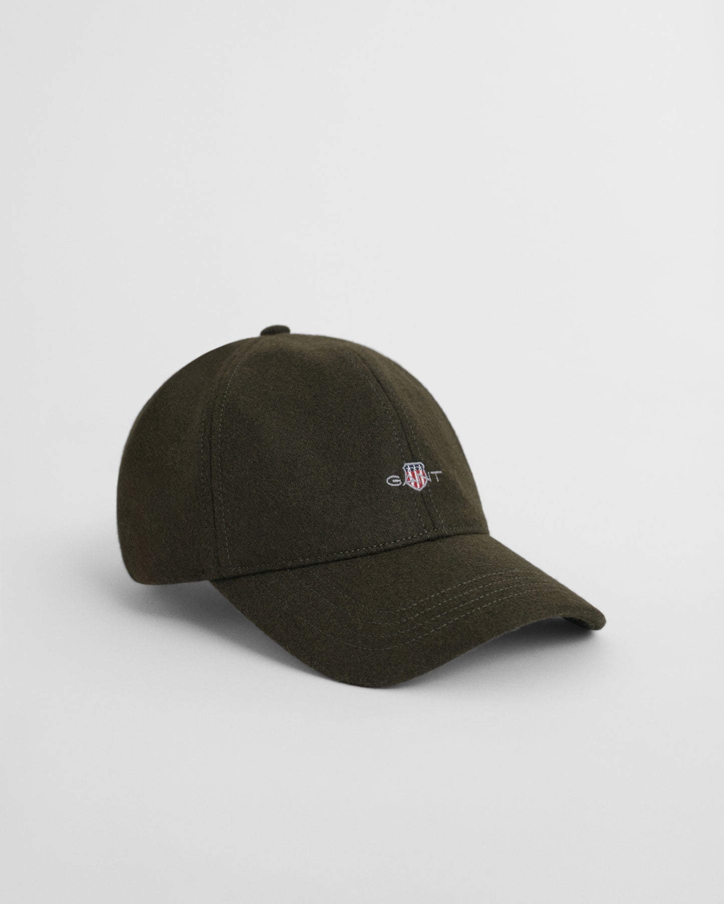 DUSK GREEN, SHIELD MELTON CAP BY GANT AU.