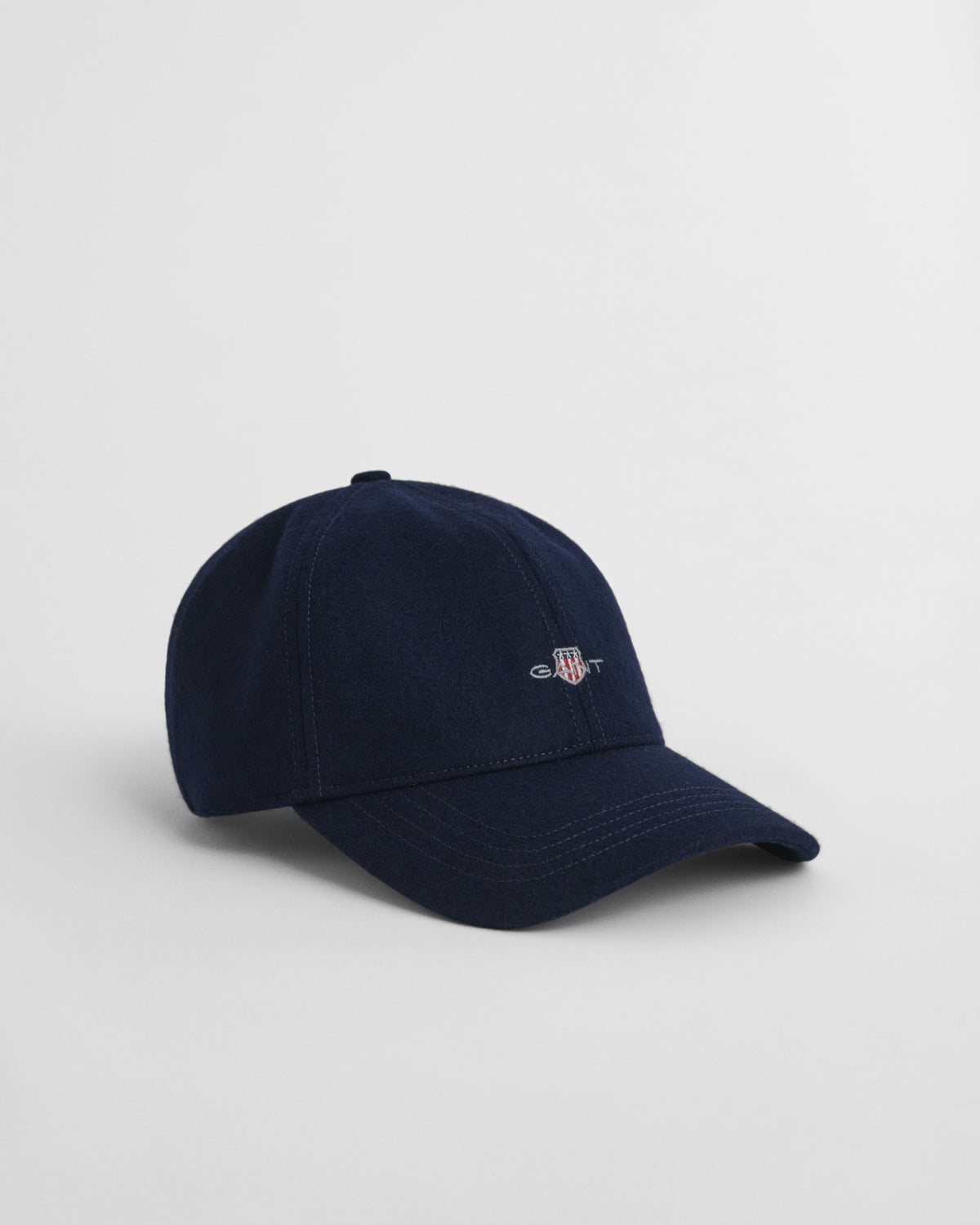 CLASSIC BLUE, SHIELD MELTON CAP BY GANT AU.