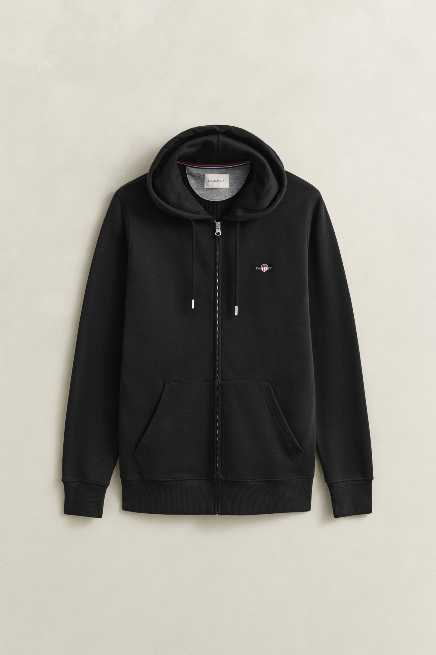 BLACK, REG SHIELD FULL ZIP HOODIE, FLAT-LAY BY GANT AU.