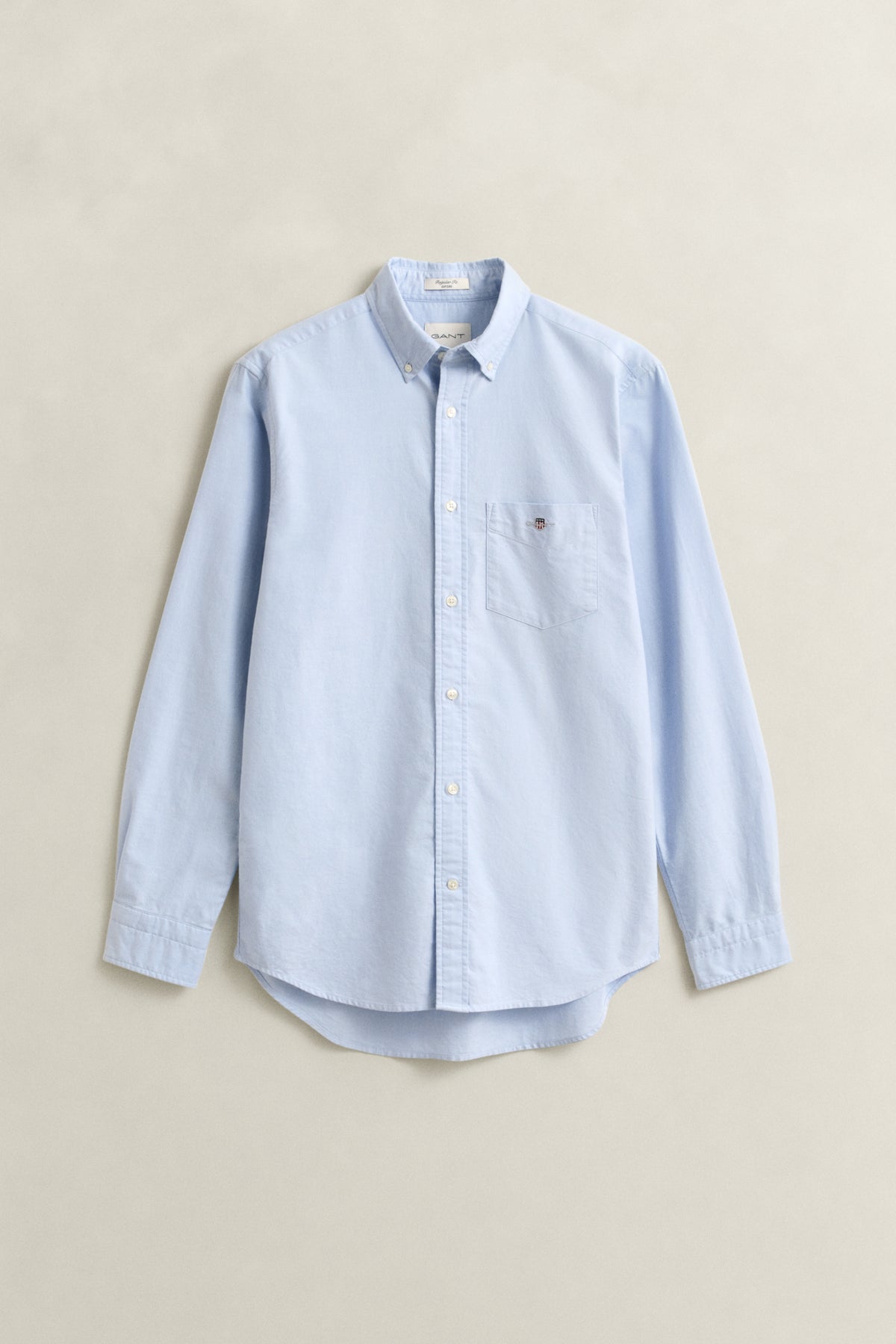 LIGHT BLUE, REG CLASSIC OXFORD SHIRT, FLAT-LAY BY GANT AU.