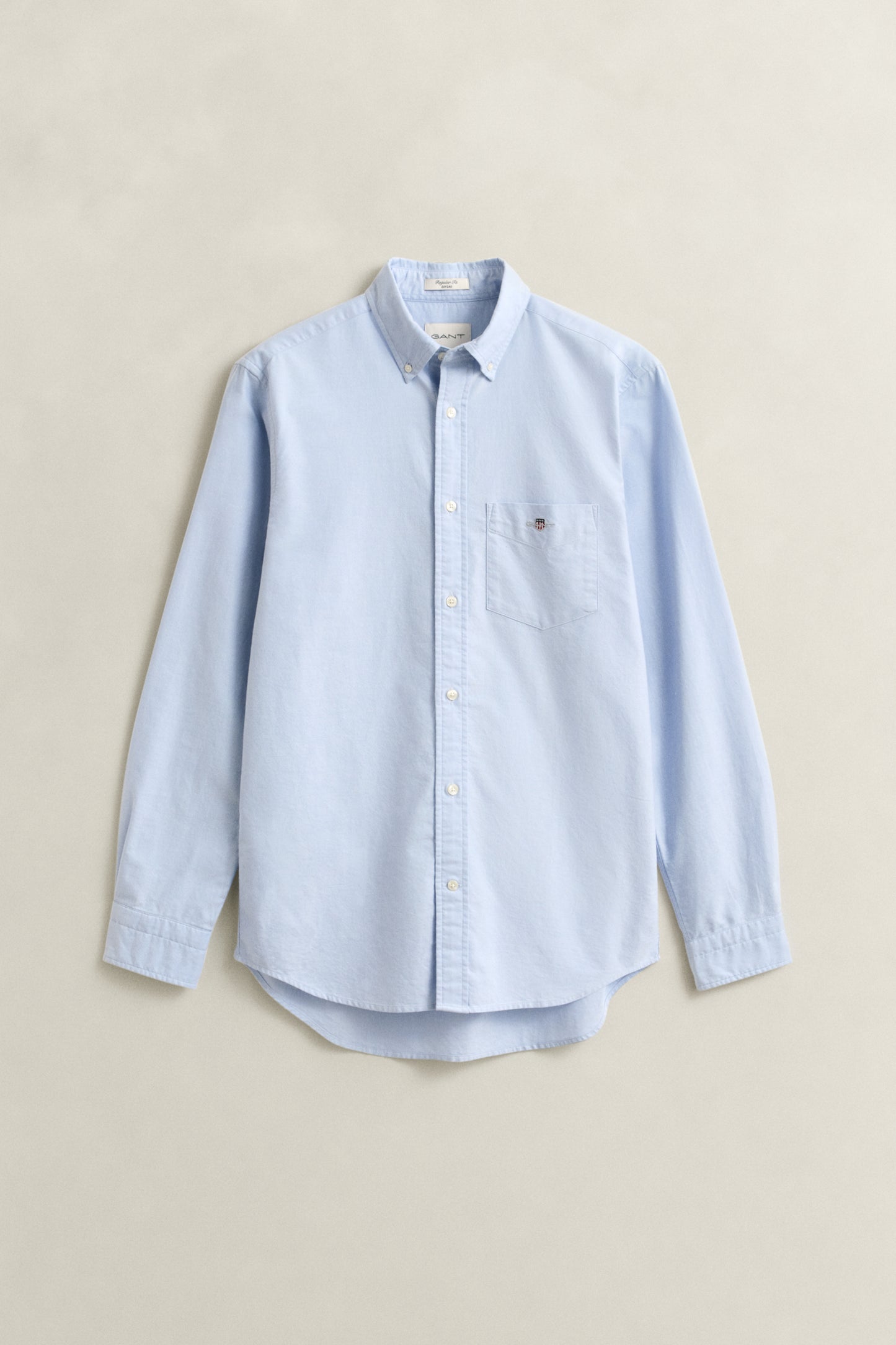 LIGHT BLUE, REG CLASSIC OXFORD SHIRT, FLAT-LAY BY GANT AU.