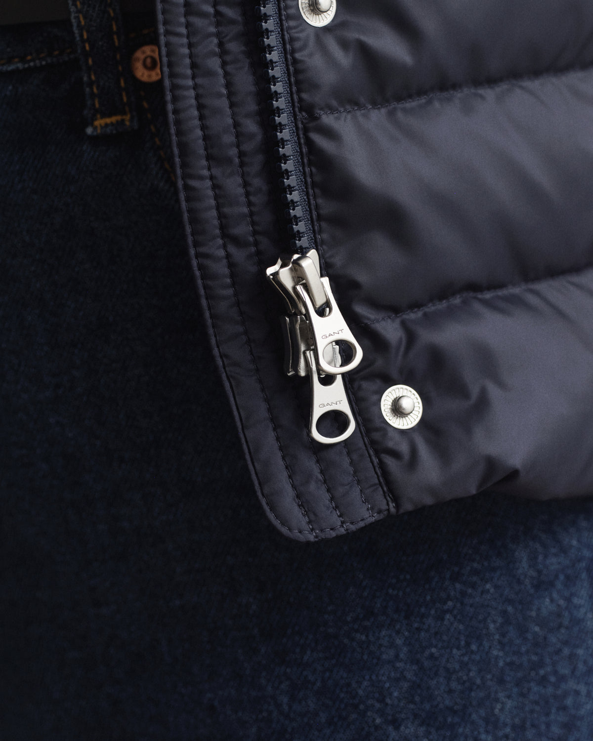 MODEL WEARING LIGHT DOWN VEST