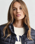 MODEL WEARING LIGHT DOWN JACKET