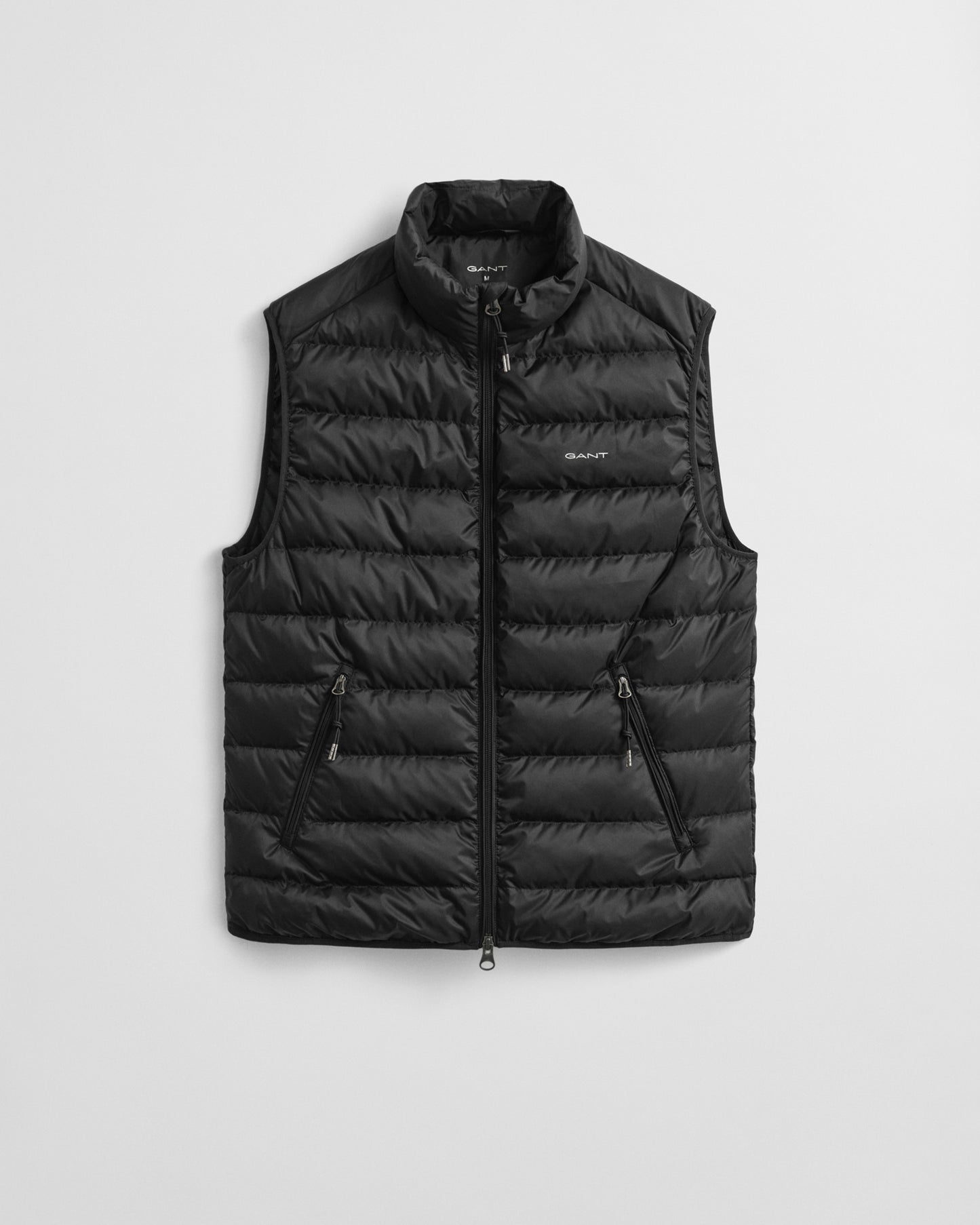 BLACK, LIGHT DOWN VEST, FLAT-LAY BY GANT AU.