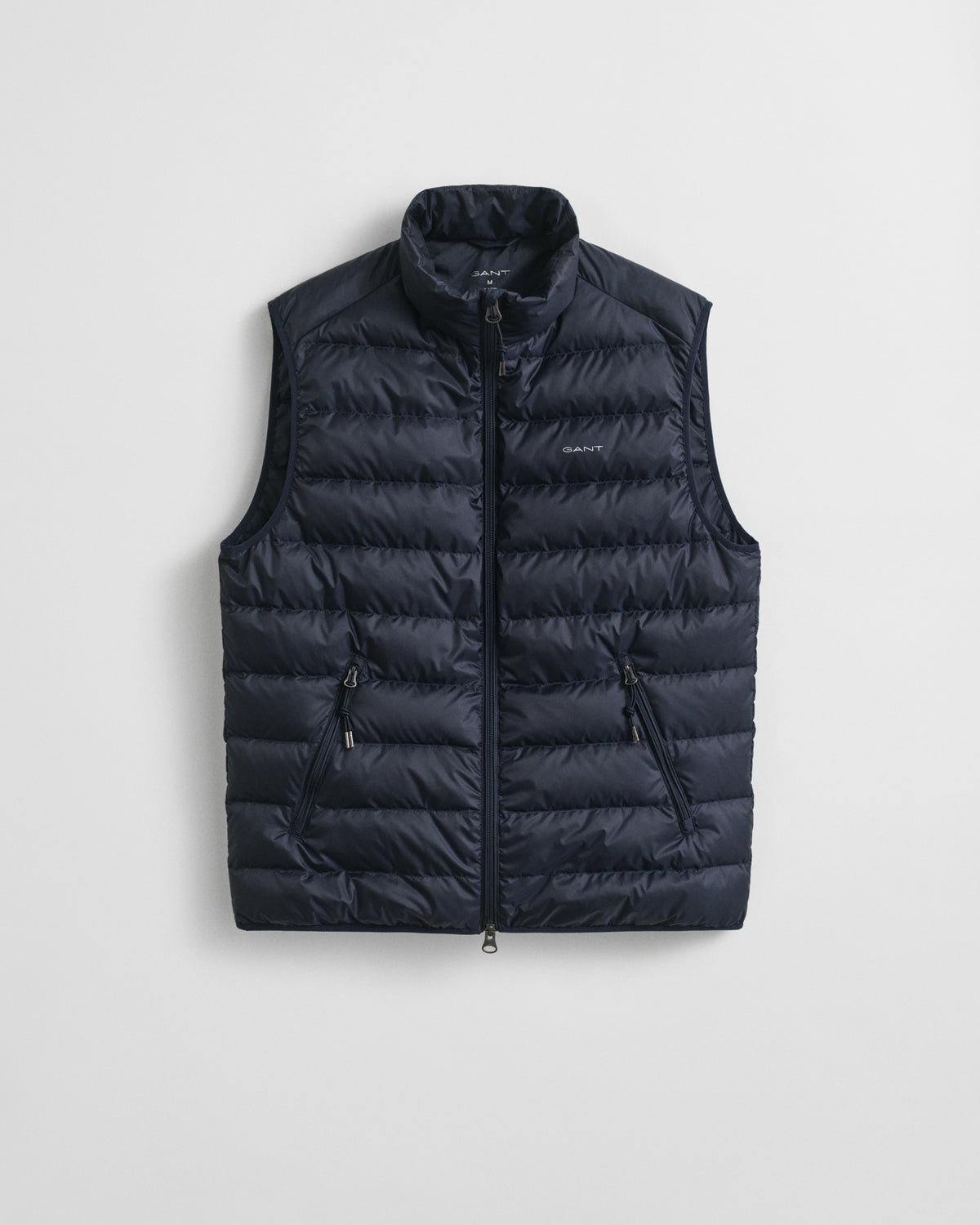 EVENING BLUE, LIGHT DOWN VEST, FLAT-LAY BY GANT AU.