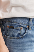 MODEL WEARING Straight Jeans