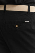 MODEL WEARING Classic Slim Chinos