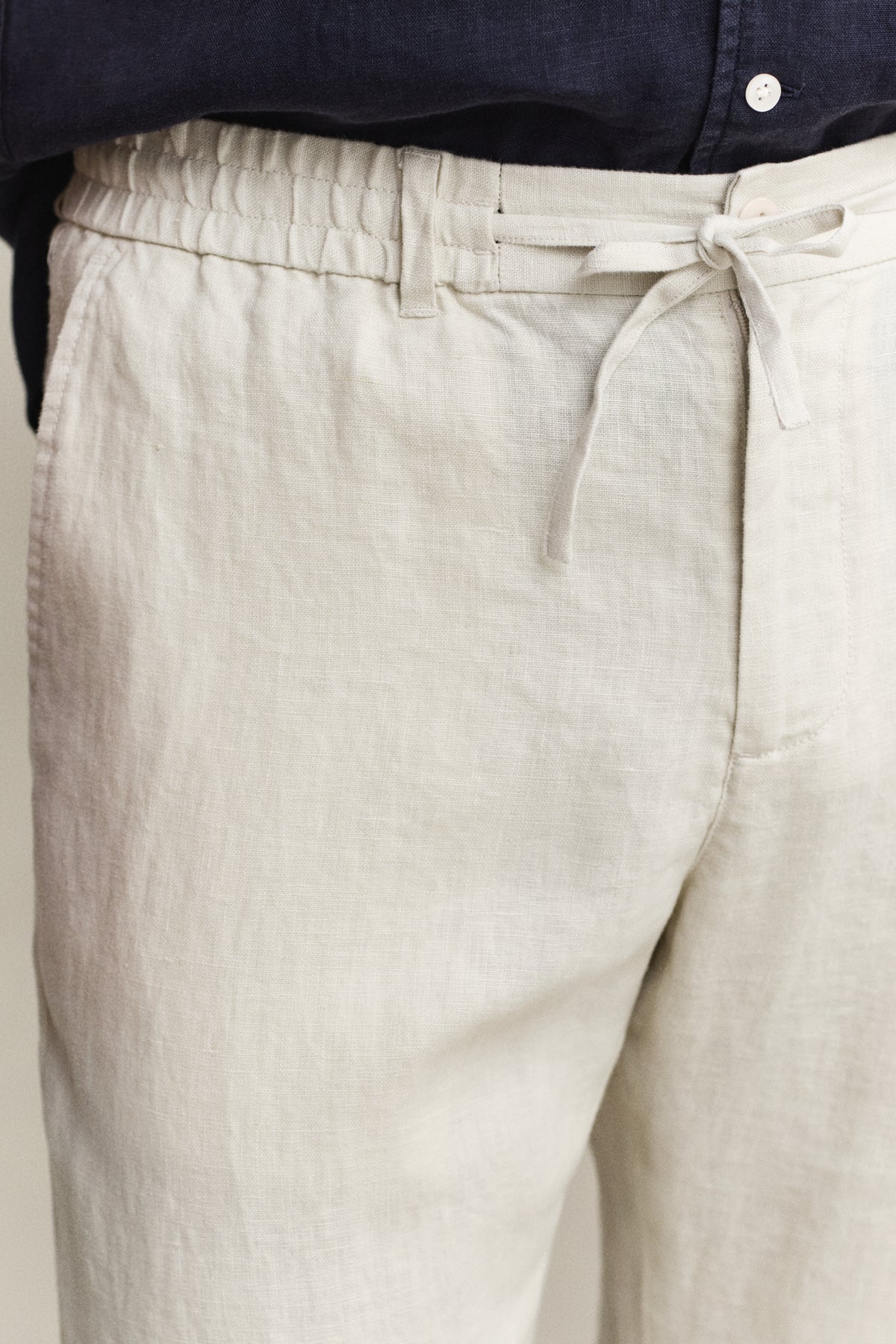 MODEL WEARING Linen Pants