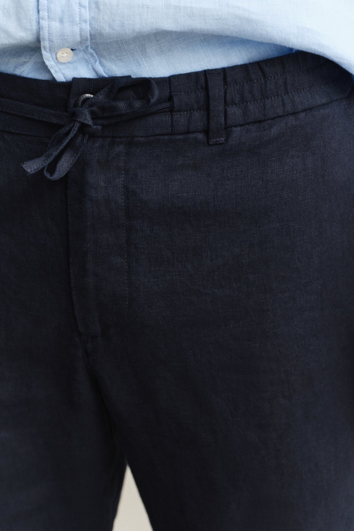 MODEL WEARING Linen Pants