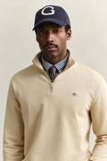 OAT BEIGE, REG SHIELD HALF ZIP SWEAT, CLOSE-UP BY GANT AU.