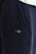MODEL WEARING REG SHIELD SWEAT SHORTS